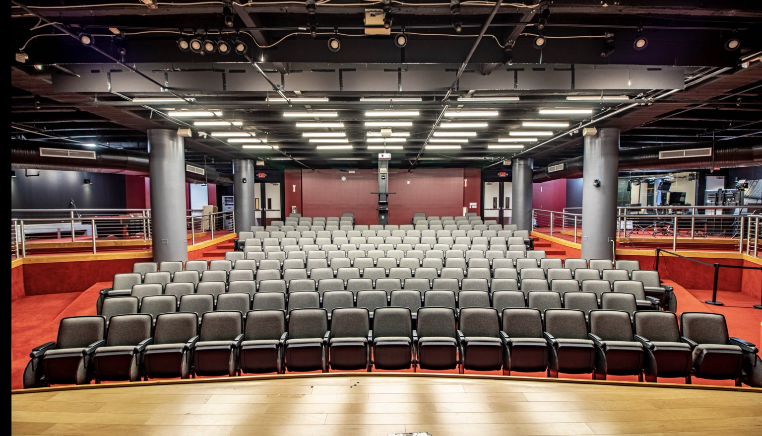 Auditorium seating and overhead building services
