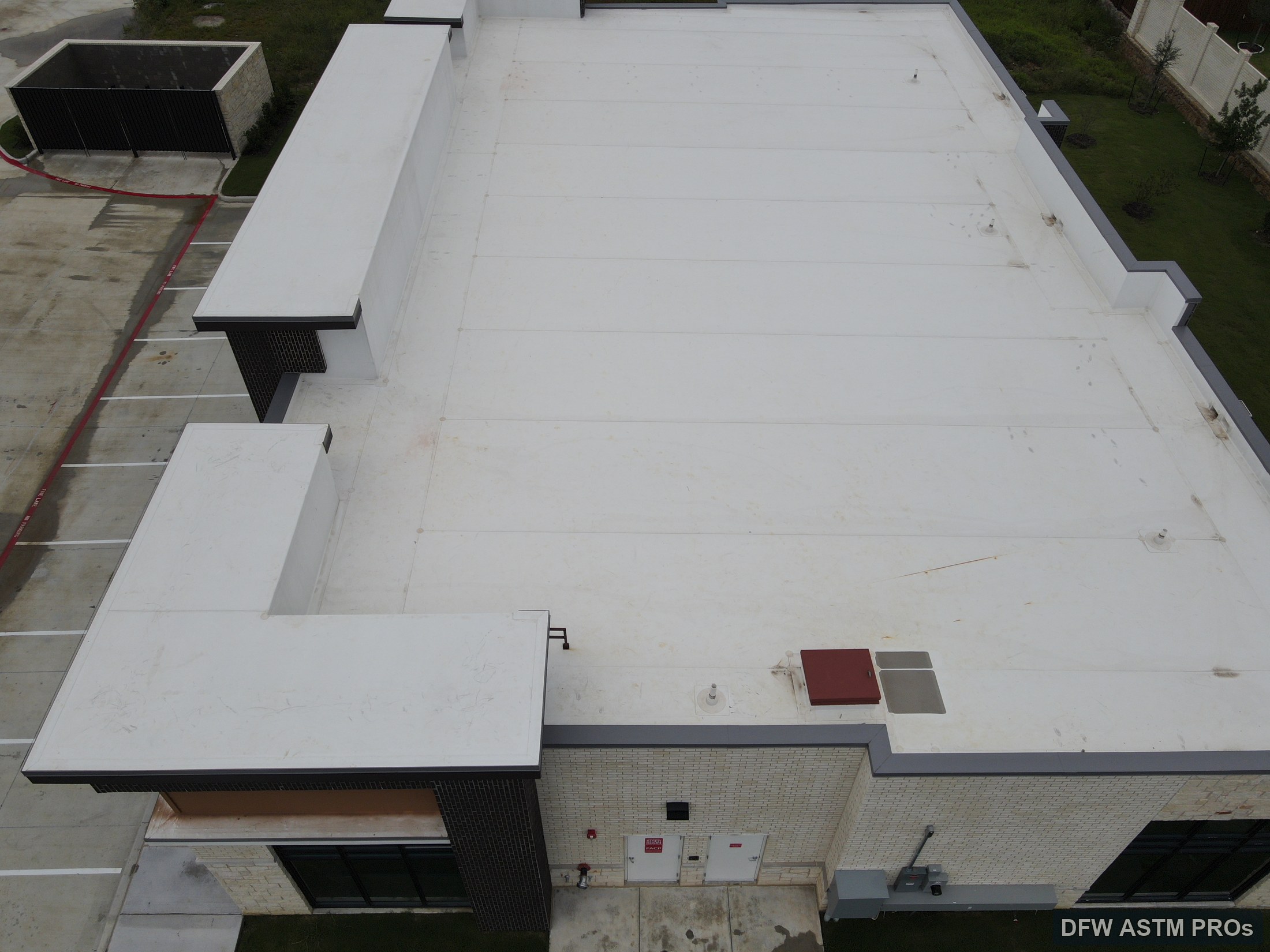 Visible aerial overview of the new white TPO roof